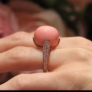 SOLLD SET OF RING AND PENDANT EARRING.  GOLD PLATED PEARL EMBEDDED AND ZIRCONIA.